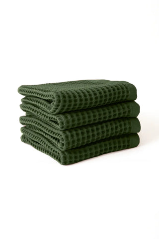 Dark Green handwoven Turkish cotton waffle weave towel set of 4 hand towels stacked. Denizli, OEKO-TEX. Vivamaison.