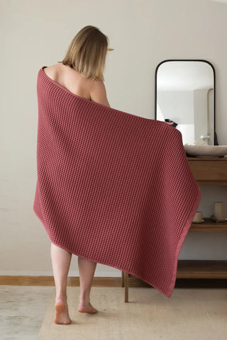 Dark Red handwoven Turkish cotton waffle weave towel lifestyle back view. Denizli, OEKO-TEX. Vivamaison.