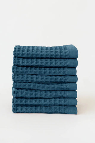 Indigo Blue handwoven Turkish cotton waffle weave towel set of 8 washcloths stacked. Denizli, OEKO-TEX. Vivamaison.