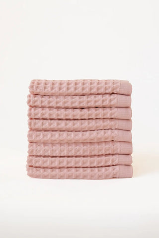 Pink handwoven Turkish cotton waffle weave towel set of 8 washcloths stacked. Denizli, OEKO-TEX. Vivamaison.