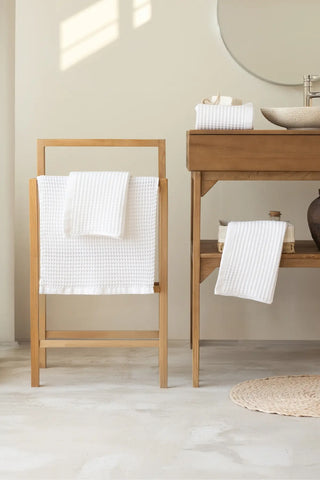 White handwoven Turkish cotton waffle weave towel hand towel folded detail. Denizli, OEKO-TEX. Vivamaison.