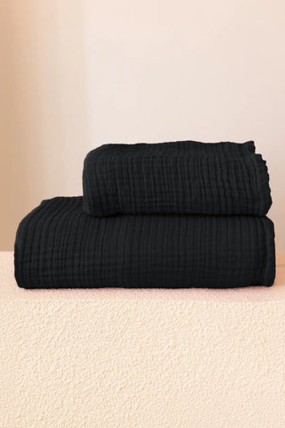 Detailed view of black 4-layer muslin weave, handwoven Turkish cotton by VivaMaison in Denizli