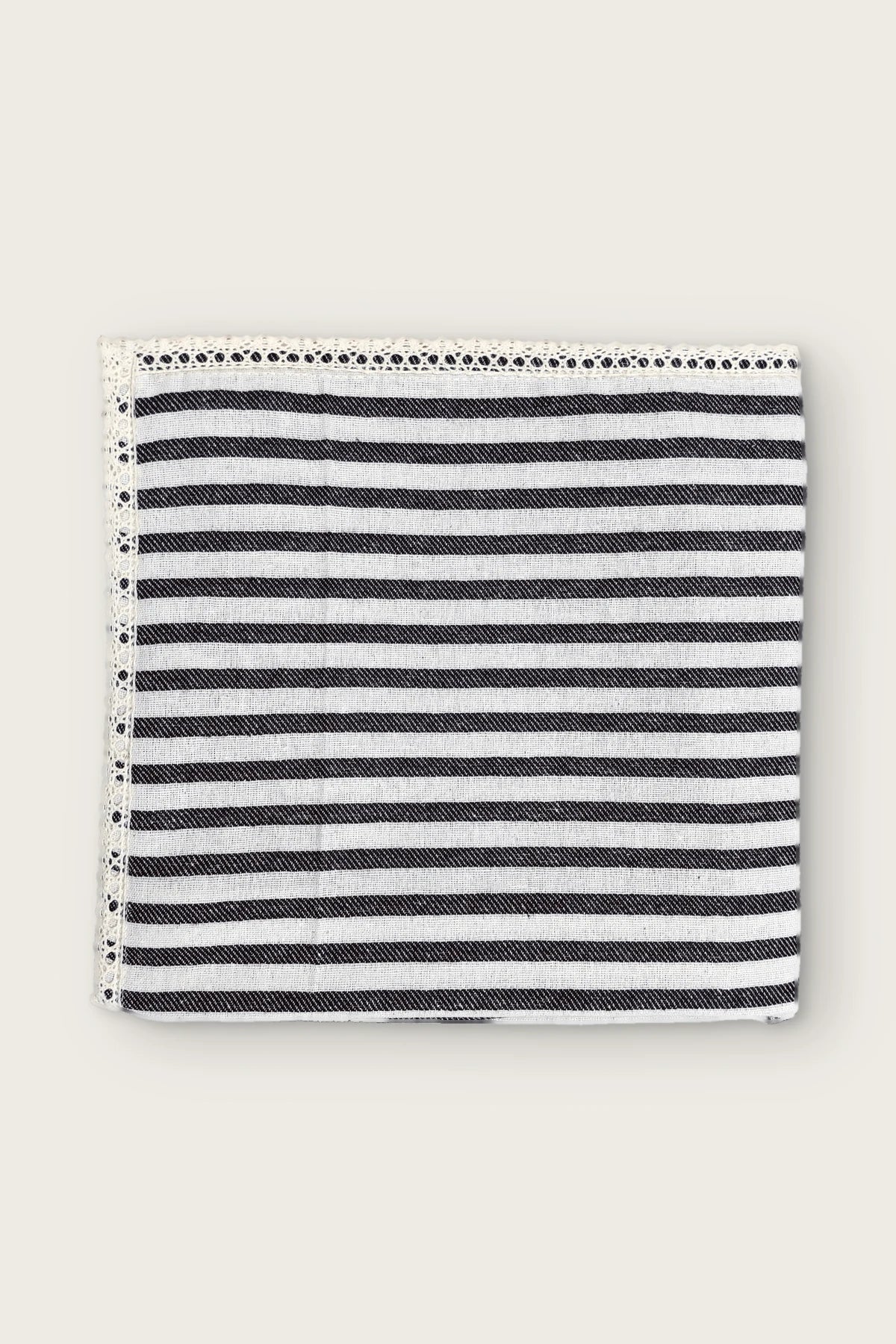 Black handwoven striped linen tablecloth with lace trim, folded front view. Denizli, OEKO-TEX. VivaMaison