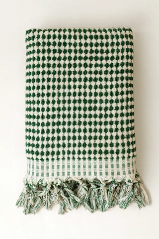 Green White Turkish cotton mosaic towel folded front view with bobble texture and knotted fringe - VivaMaison