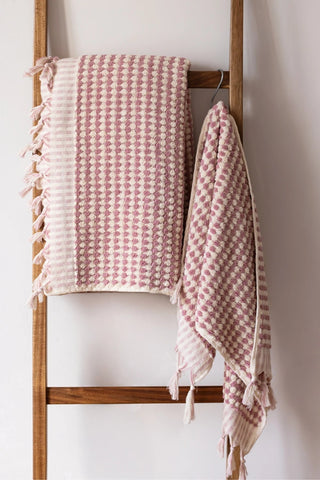 Pink Turkish cotton mosaic towel hanging on a wooden ladder - VivaMaison
