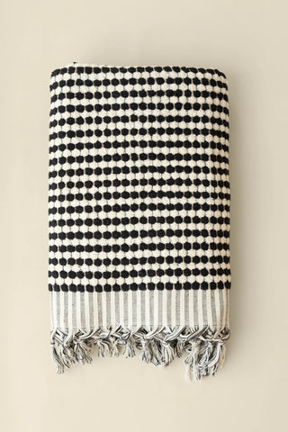 Anthracite White Turkish cotton pom pom towel folded front view with bobble texture and knotted fringe - VivaMaison