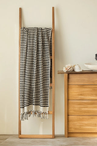 Anthracite White Turkish cotton pom pom towel hanging on a wooden ladder - VivaMaison