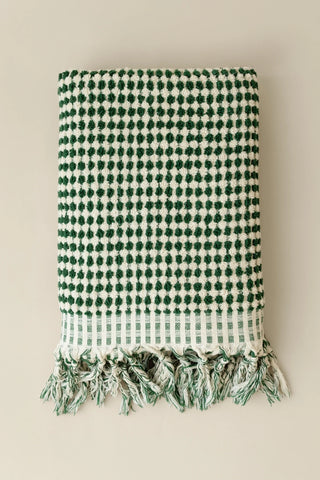 Green White Turkish cotton pom pom towel folded front view with bobble texture and knotted fringe - VivaMaison