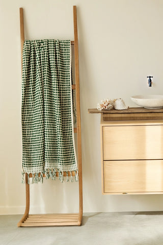 Green White Turkish cotton pom pom towel hanging on a wooden ladder - VivaMaison