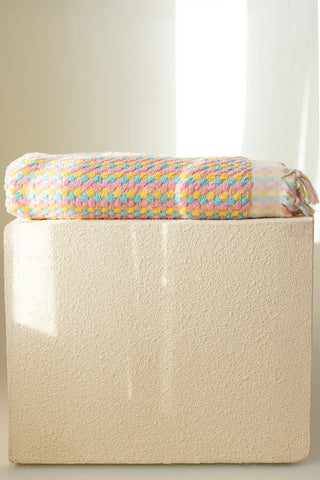 Mint Pink Turkish cotton pom pom towel folded on a plinth - VivaMaison