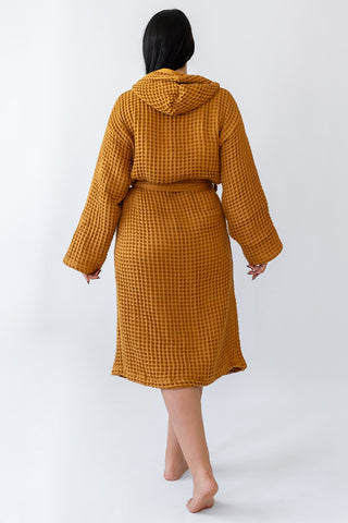 Caramel waffle cotton bathrobe showing hooded design and honeycomb weave texture