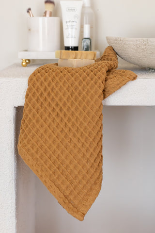 Caramel waffle towel set styled bathroom view - spa-quality Aegean cotton