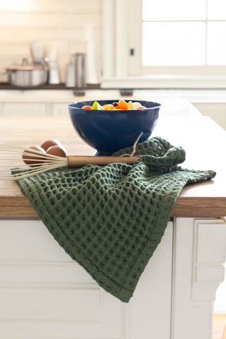 Green waffle towel set showing coordinated face hand bath towels by Vivamaison