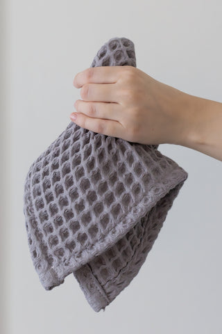Grey waffle towel set showing coordinated face hand bath towels by Vivamaison