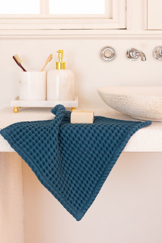 Indigo waffle towel set styled bathroom view - spa-quality Aegean cotton