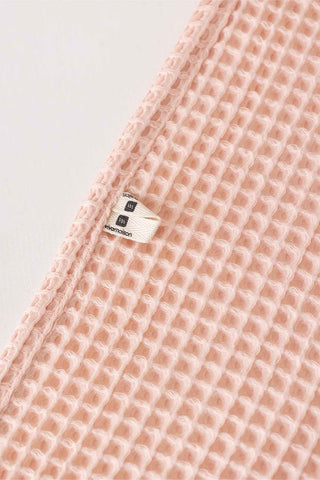 Waffle Towels are expertly crafted to provide maximum absorbency and durability. Made from 100% cotton, these towels feature a unique waffle design that allows for quick drying and a soft touch. Perfect for any bathroom, these towels offer a luxurious and practical addition to your daily routine.