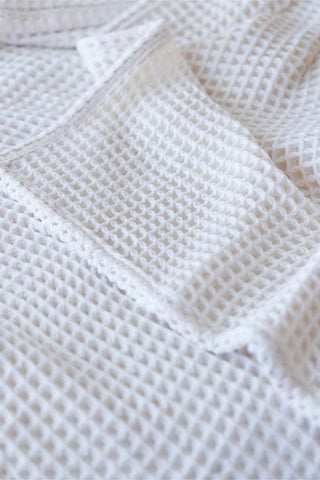Natural waffle cotton bedspread styled bedroom view - long-staple Aegean cotton